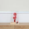 Hagoita paddle with red floral decorations. Wholesale by Fujiki Crafts.