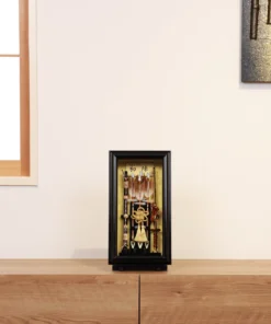 Traditional Japanese Hamaya arrow display with golden accents in black case, for cultural decor and protective gift sets. Wholesale by Fujiki Crafts.