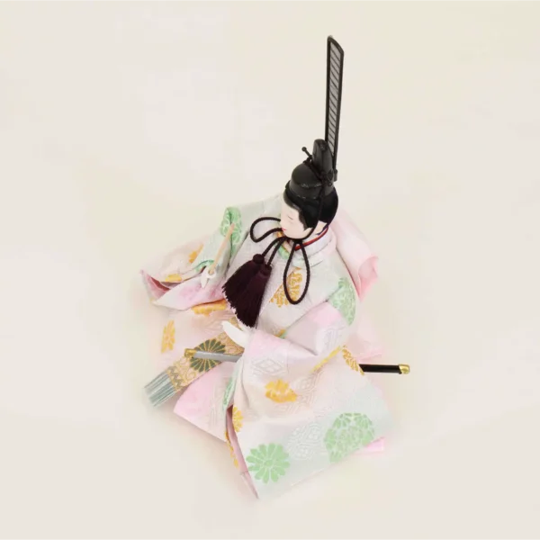 Emperor Hina doll in multicolour silk kimono with fan and sword. Wholesale by Fujiki crafts.