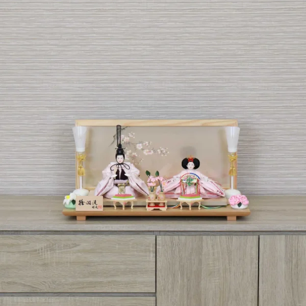 Hina doll set with wooden glass backdrop with cherry blossom and seasonal ornaments. Wholesale by Fujiki crafts.