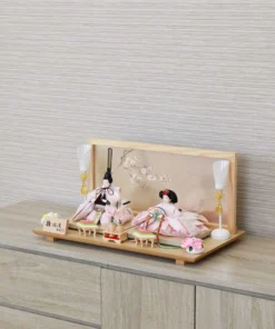 Hina doll set with wooden glass backdrop with cherry blossom and seasonal ornaments. Wholesale by Fujiki crafts.