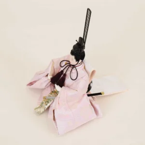 Emperor Hina doll in light pink silk kimono with fan and sword. Wholesale by Fujiki crafts.