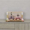 Hina doll set with wooden glass backdrop with cherry blossom and seasonal ornaments. Wholesale by Fujiki crafts.