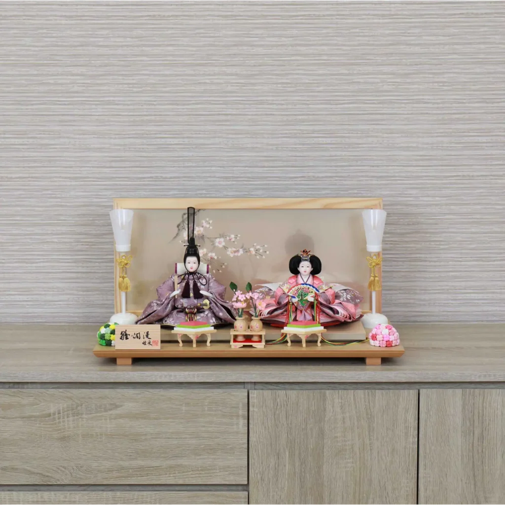 Hina doll set with wooden glass backdrop with cherry blossom and seasonal ornaments. Wholesale by Fujiki crafts.