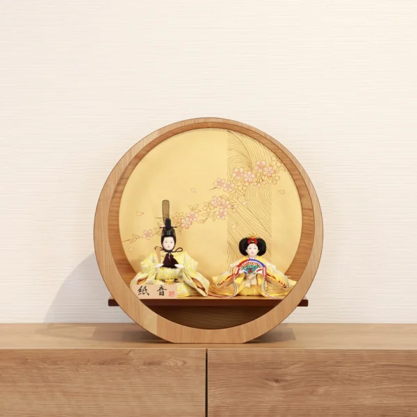 Circular Japanese Hina doll display with cherry blossom screen. Wholesale by Fujiki Crafts.