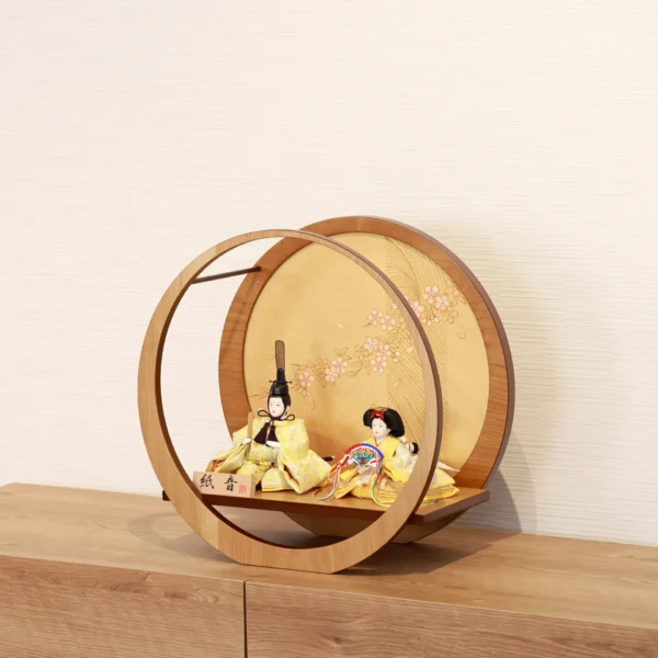 Circular Japanese Hina doll display with cherry blossom screen. Wholesale by Fujiki Crafts.