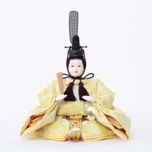 Emperor Hina doll in yellow brocade kimono. Wholesale by Fujiki Crafts.