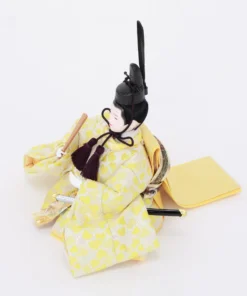 Emperor Hina doll in yellow brocade kimono. Wholesale by Fujiki Crafts.