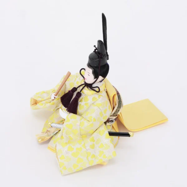 Emperor Hina doll in yellow brocade kimono. Wholesale by Fujiki Crafts.