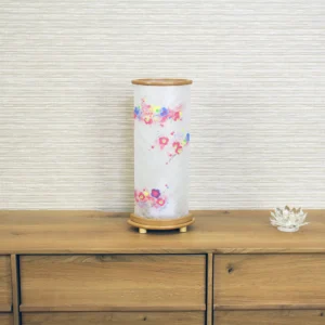 Handcrafted Japanese Chouchin lantern with plum blossom washi paper and wooden base. Wholesale by Fujiki Crafts.