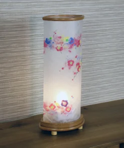 Handcrafted Japanese Chouchin lantern with plum blossom washi paper and wooden base. Wholesale by Fujiki Crafts.