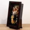 Japanese Hamaya arrows display set featuring golden arrows, black scabbard sword, and ornate gold tassel in black lacquer case. Wholesale by Fujiki Crafts.